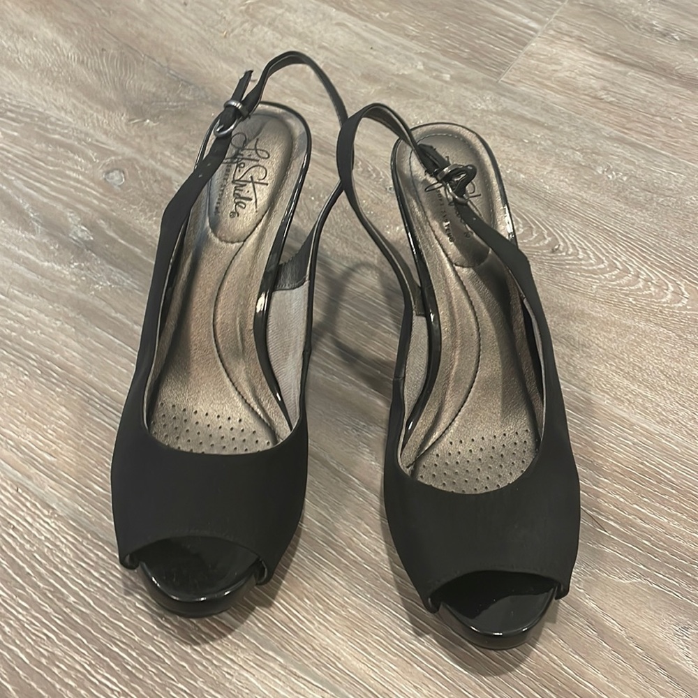 Black sling back pumps